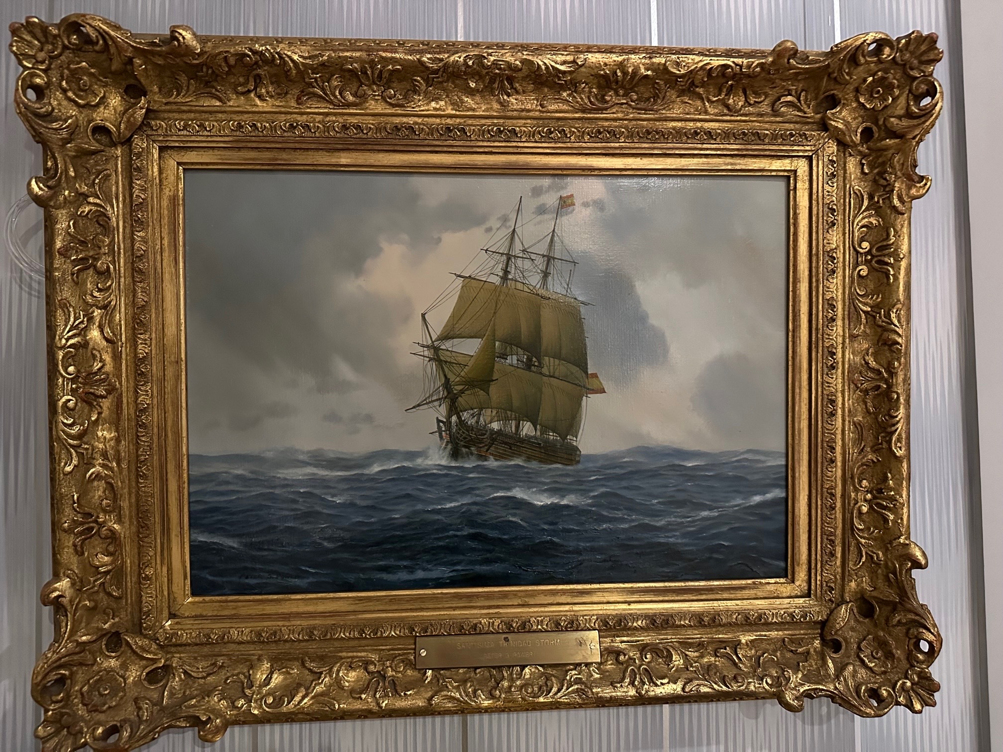 El Santísima Trinidad en el temporal, óleo en su marco dorado